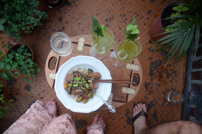 Eating a summer dinner on an UES NYC balcony