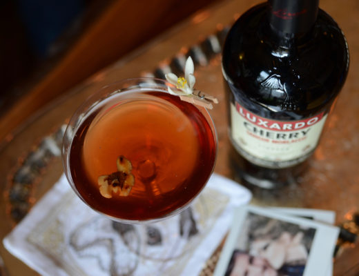 cocktail with cherry liqueur and toasted walnut