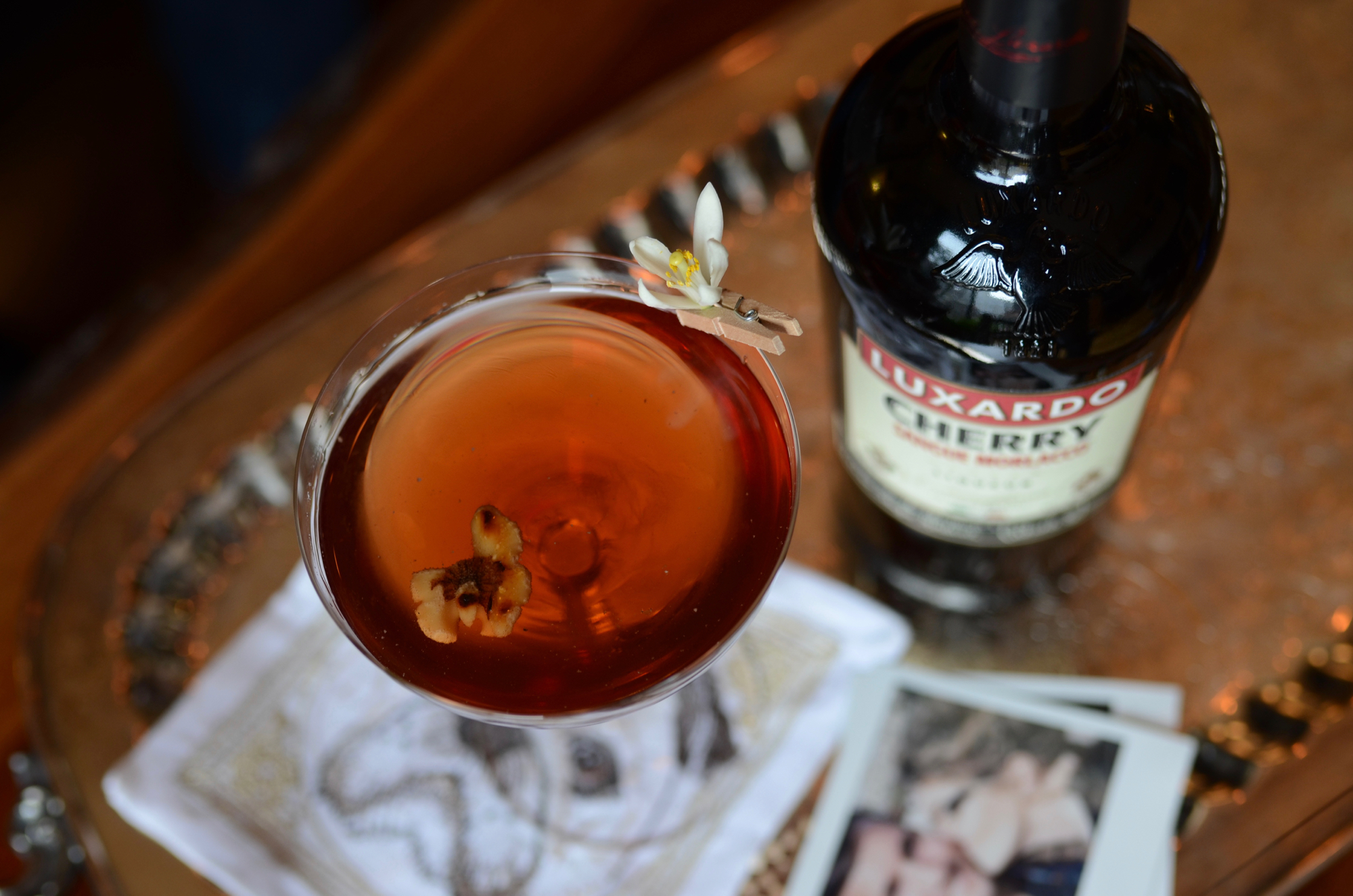 cocktail with cherry liqueur and toasted walnut