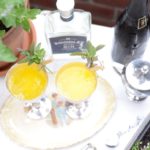 yellow cocktail with Boodles Gin with mint garnish